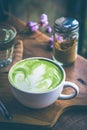 Green tea hot drink latte white cup on wood table aroma relax ti Royalty Free Stock Photo