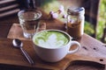 Green tea hot drink latte white cup on wood table aroma relax ti Royalty Free Stock Photo