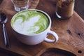 Green tea hot drink latte white cup on wood table aroma relax ti Royalty Free Stock Photo