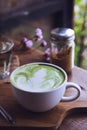 Green tea hot drink latte white cup on wood table aroma relax ti Royalty Free Stock Photo