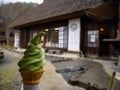 Green tea ice cream soft serve cone with traditional japanese ho