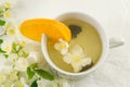 Green tea with jasmine leaf in a cup Royalty Free Stock Photo