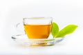 Green tea leaf and glass cup of black tea Royalty Free Stock Photo