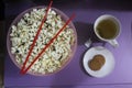 Green tea lemon flavor and teabag with biscuit and popcorn