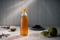 Green tea with green Mandarin oil in a plastic bottle Royalty Free Stock Photo