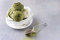 Green Tea Matcha and Coconut Ice Cream in White Bowl on a Grey Background Tasty Healthy Vegan Ice Cream Horizontal Royalty Free Stock Photo