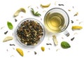 Green tea with natural aromatic additives and a cup. Top view on white background Royalty Free Stock Photo