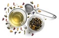 Green tea with natural flavors and a cup. Top view on white background Royalty Free Stock Photo