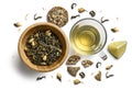 Green tea with natural flavors and a cup. Top view on white background Royalty Free Stock Photo