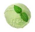 Green tea or pistachio ice cream ball with a mint leaf isolated on white background, top view Royalty Free Stock Photo