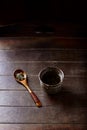 Green tea sencha in a traditional, japanese tea cup and sencha leaves on a wooden tea spoon. Royalty Free Stock Photo