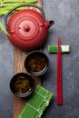 Green tea and sushi chopsticks Royalty Free Stock Photo