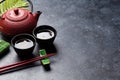 Green tea and sushi chopsticks. Japanese meal set Royalty Free Stock Photo