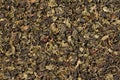 A green tea texture, background, pattern. Pile of green tea