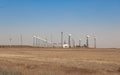 Onshore wind farm, using several horizontal axis turbines, summer day Royalty Free Stock Photo