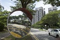 A green technology high-rise building and traffic mirror