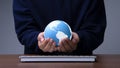 Green technology.Man hand hands holding the earth globe with computer keyboard.Global connection concept. Energy saving concept Royalty Free Stock Photo