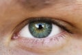 Green teen girl eye closeup front view outdoor