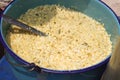 Corn kernels in a blue pot, known as Esquites