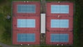 Green Tennis Court Arena. View from the bird`s flight. Aerial photography. Urban city town in Asia Royalty Free Stock Photo