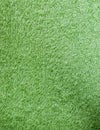 Green terry cloth towel texture. background, bedroom. Royalty Free Stock Photo