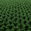 Green textured surface with a pattern of densely packed, looped fibers, resembling Royalty Free Stock Photo