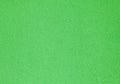 Green textured wall, texture, background. Plane, uneven surface in green color Royalty Free Stock Photo