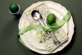 Green theme Happy Easter dinner or breakfast table setting Royalty Free Stock Photo