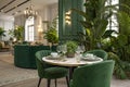 Green interior with dining table and decor Royalty Free Stock Photo