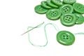 Green thread and buttons on white Royalty Free Stock Photo