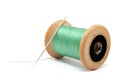 Green thread and needle Royalty Free Stock Photo