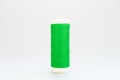 Green threads for sewing on a white background Royalty Free Stock Photo