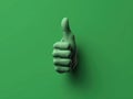 Green thumbs up is being given by an individual. The person\'s hand is raised and their index finger is extended to show