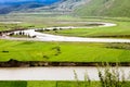 Green Tibet landscape on sunny day with color filter Royalty Free Stock Photo