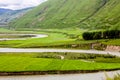 Green Tibet landscape on sunny day with color filter Royalty Free Stock Photo