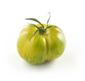 Green tiger tomato on white Royalty Free Stock Photo