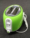 Green toaster - details of kitchen electric appliance