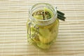 Green tomato in a jar with vinegar Royalty Free Stock Photo