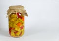 Green tomatoes, paprika, cucumbers, pickled carrots in a transparent jar Royalty Free Stock Photo