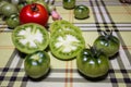 Green tomatoes on the table