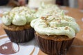 Green topping cupcakes close up