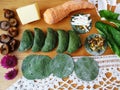 Green tortellini, dough cooked from nettle