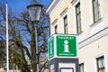 Green Tourist information sign in the city center. Tourist point, help desk, city guide Royalty Free Stock Photo