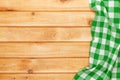 Green towel over wooden kitchen table Royalty Free Stock Photo