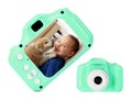 Green toy cameras on white background in collage, one with photo of boy and puppy Royalty Free Stock Photo