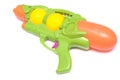 Green toy water gun against a white backdrop Royalty Free Stock Photo