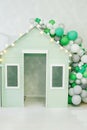 Green toy wooden children`s house