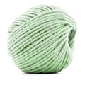 Green traditional clew, crochet thread roll isolated on white background