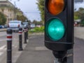 Green traffic light in the city street close Royalty Free Stock Photo