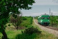 Green train or zeleni vlak, connecting Ljubljana, Slovenia and Pula, Croatia, on its way towards the end station. Picturesque Royalty Free Stock Photo